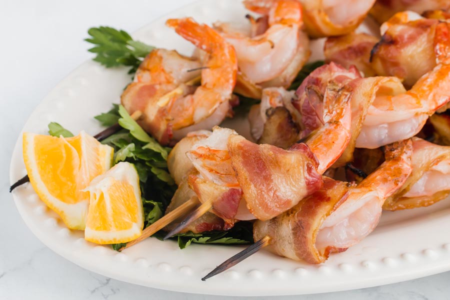 bacon wrapped shrimp with side of lemon