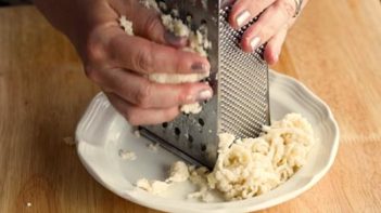 shredded dough with a cheese grater