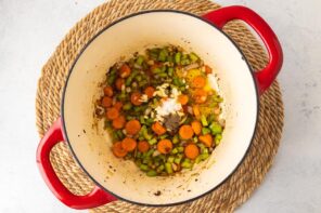 Carrots, celery and onion cooked in a Dutch oven.